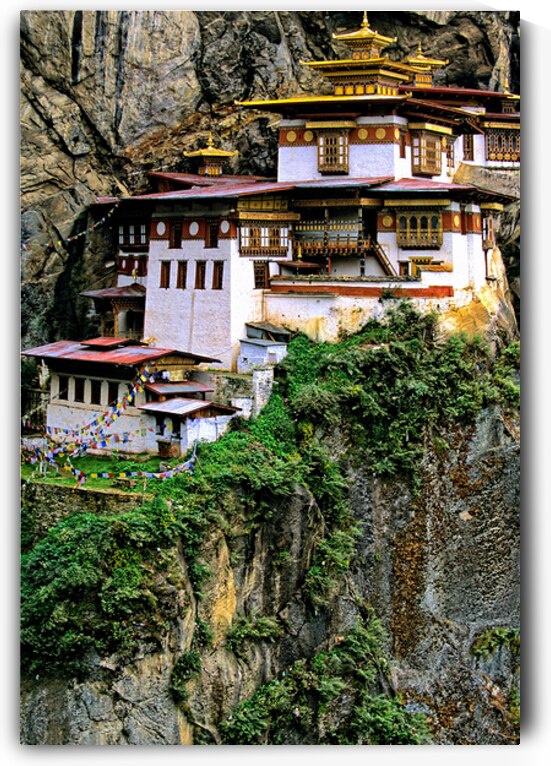 Bhutan. Taktsang is one of the most venerated pilgrim sites of the Himalayan world located in the Valley of Paro by Marco Brivio