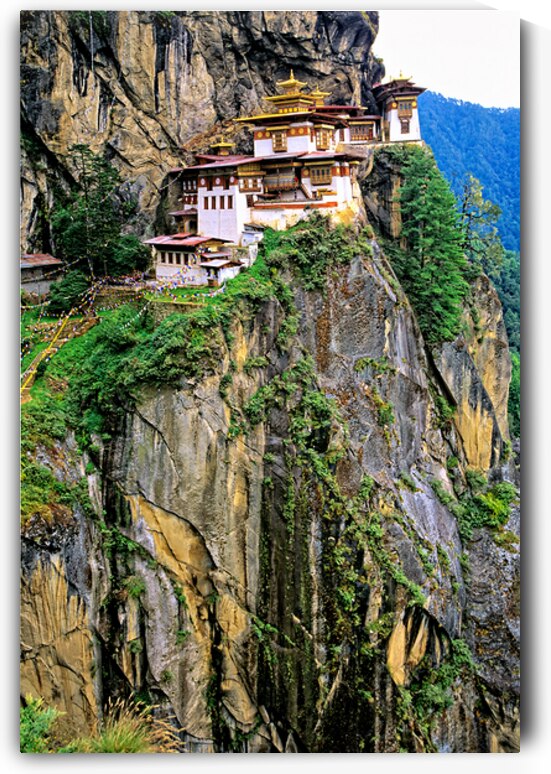 Bhutan. Taktsang is one of the most venerated pilgrim sites of the Himalayan world located in the Valley of Paro by Marco Brivio